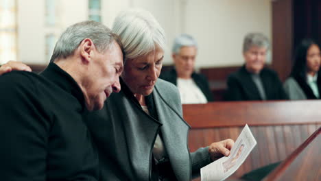 sad, hug and senior couple at a funeral