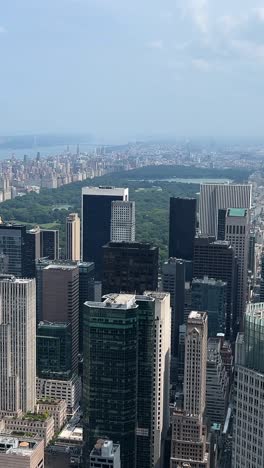 aerial view of new yorks skyline features its architecture and parks experience a stunning aerial view of a vibrant city skyline with towering buildings and parks showcasing the harmony of urban life and nature