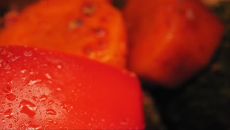 Cinematic-close-up-macro-pan-of-grilled-vegetables-including-a-juicy-and-wet-red-bell-pepper