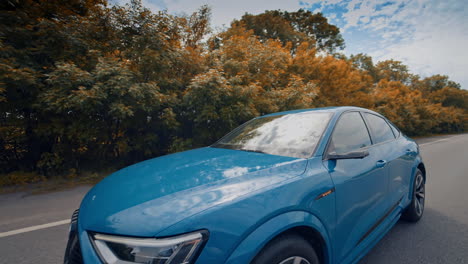 Audi e-tron sportback on road. Audi e-tron luxurious car exterior with elegant sport elements and expensive metallic design