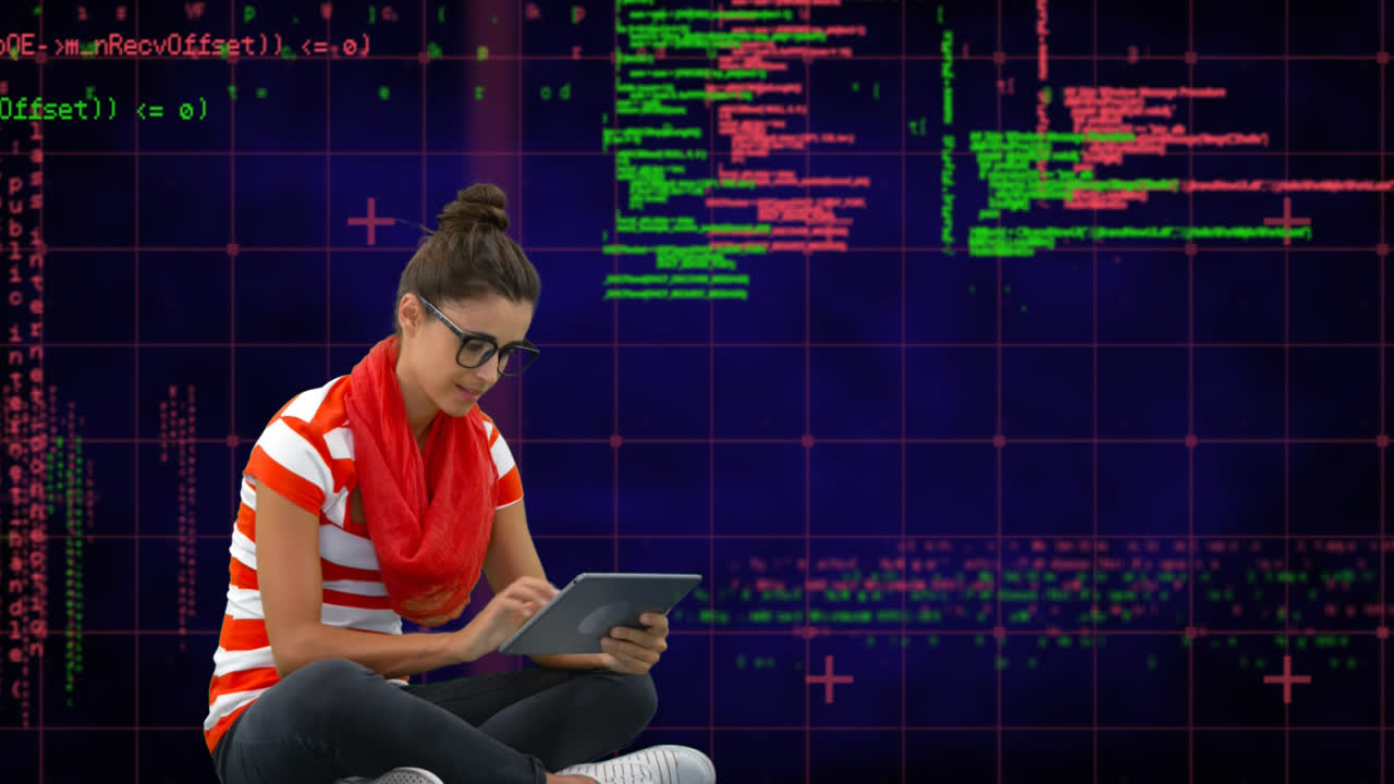 Woman seated on the floor using a tablet