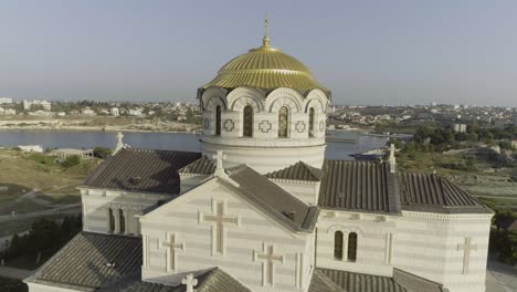 aerial view of a church with a golden dome