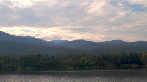 Beautiful-view-over-lake-at-sunset-with-mountains-in-distance