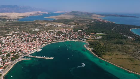 panoramic view on the touristic town of novalja on the island of pag, croatia - aerial drone shot