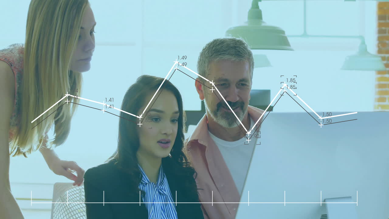 Analyzing financial graph data, business team in office using computer screen