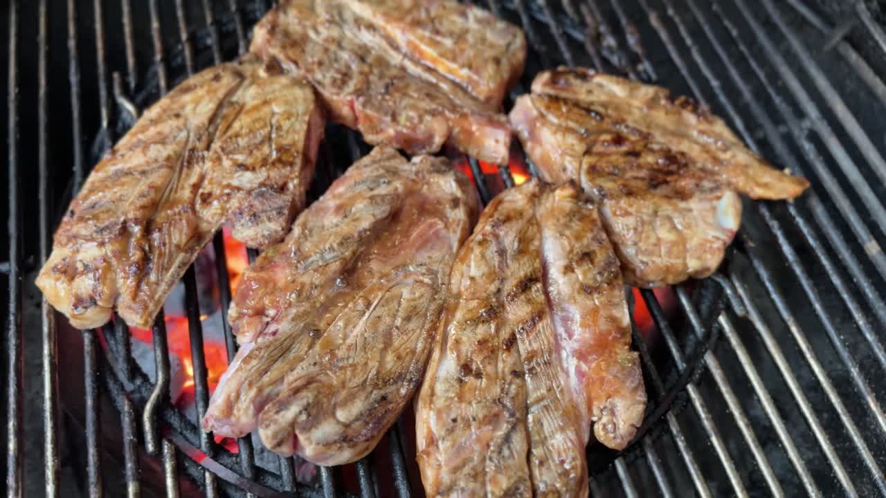Cooking lamb chops on a barbecue