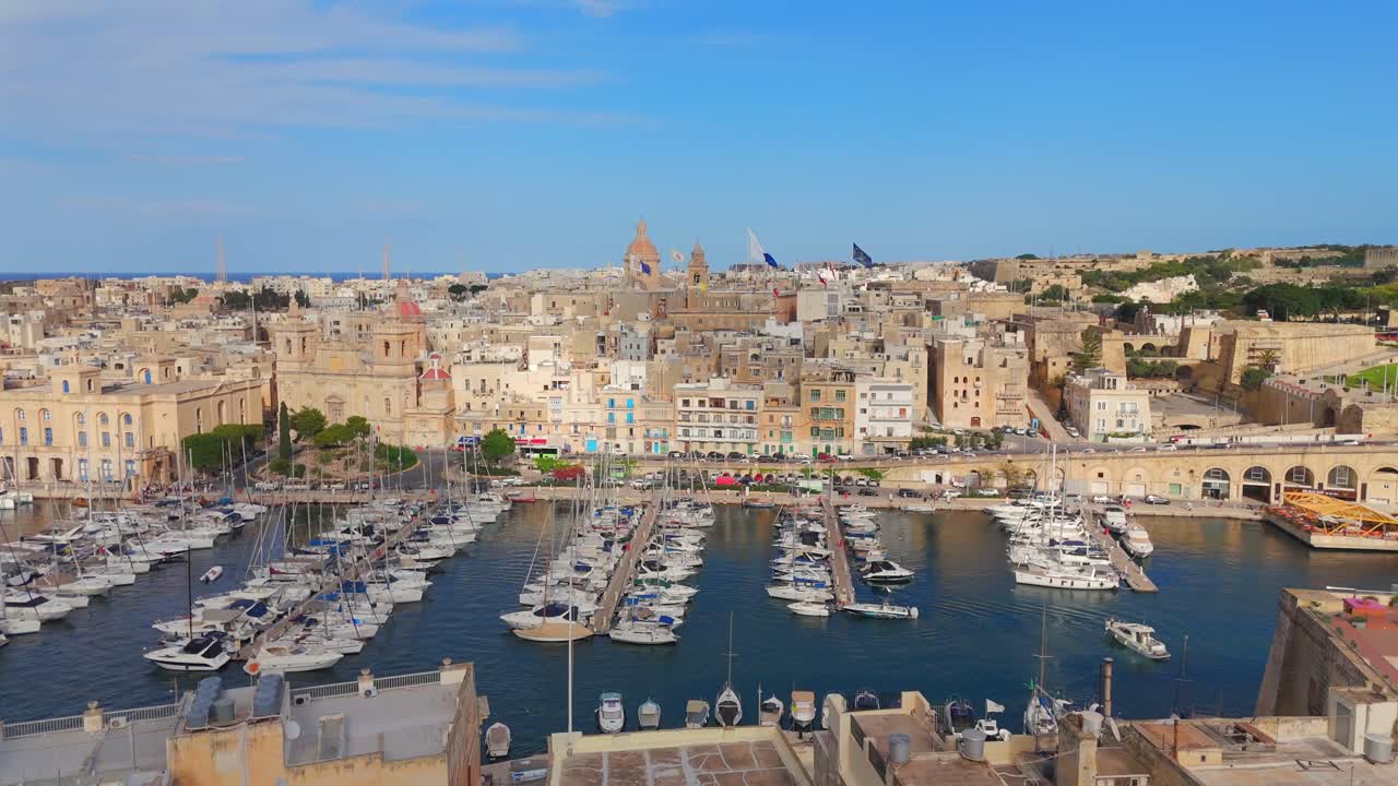 Aerial footage of Birgu reveals the grand Fort St. Angelo, standing proudly over the city and the surrounding Mediterranean waters.