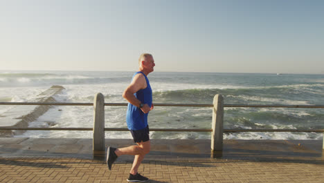 senior man running on the promenade