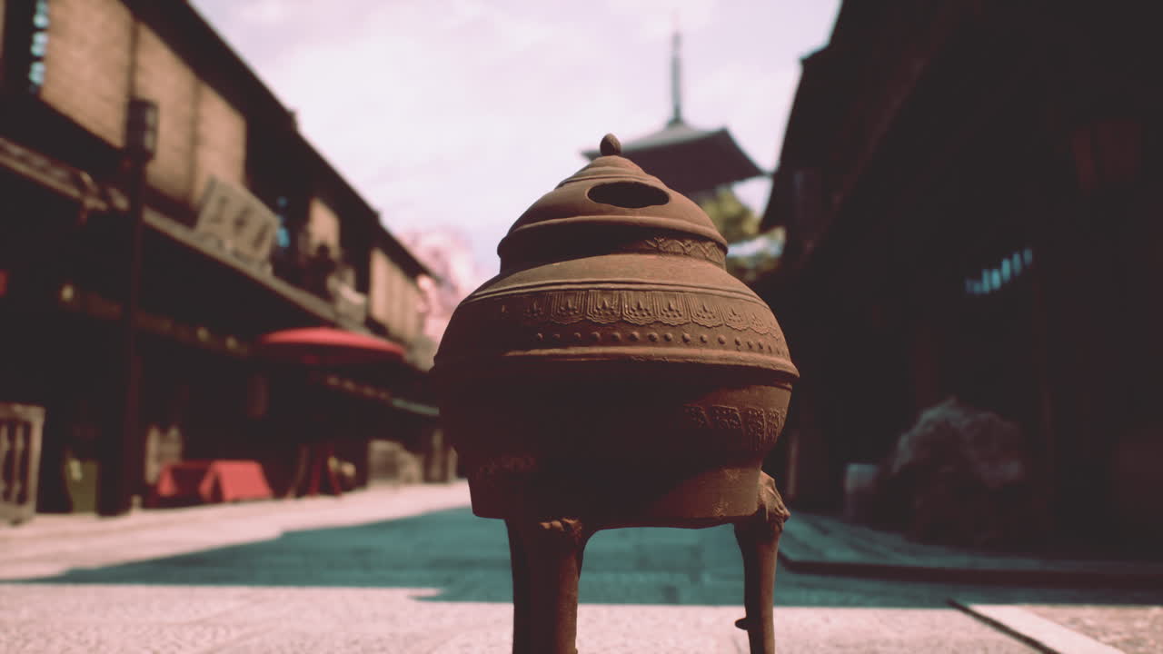 Ancient Japanese Incense Burner on a Tranquil Street