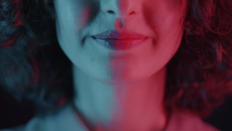close-up of a woman's face with neon lighting