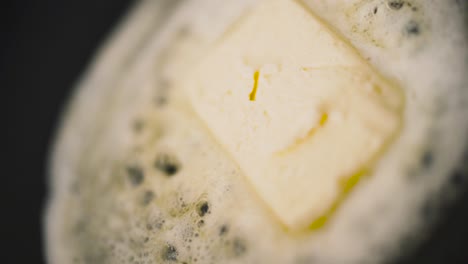 butter melting in a pan