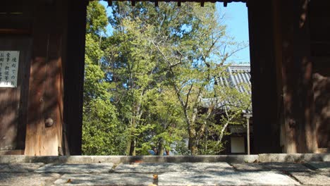 slide shot of an entrance to a temple in kyoto, japan 4k slow motion