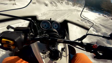 man driving snowmobile, pov race at high speed