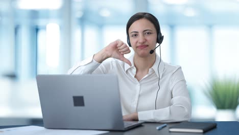 Upset-Indian-call-center-girl-showing-thumbs-down