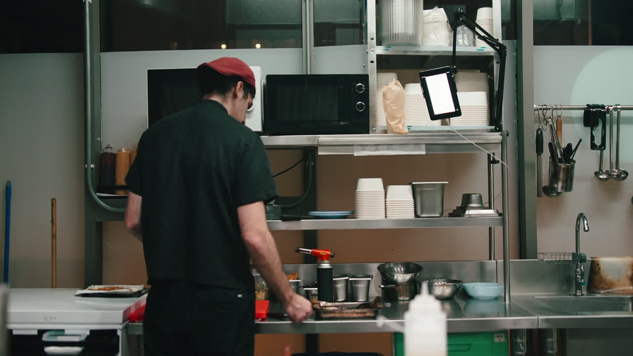 Commercial Kitchen Scene with Chefs and Equipment