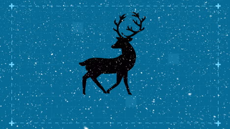nieve cayendo sobre la silueta de renos caminando sobre un fondo azul
