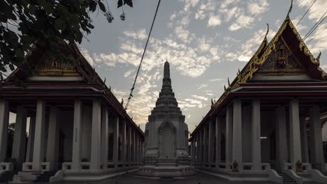 a 4k time lapse of dawn at a buddhist temple in bangkok, thailand