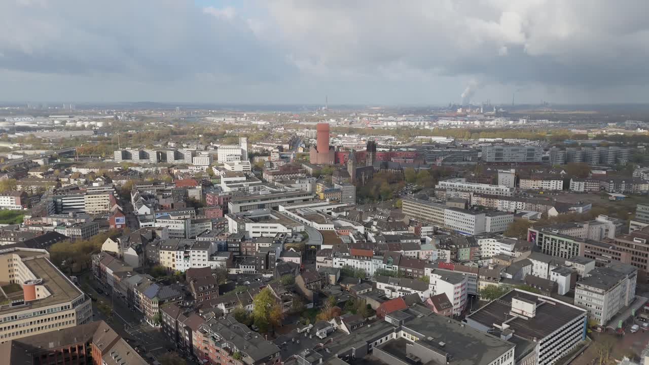 Duisburg Germany city centre, Ruhr area. Drone establishing shot, partly cloudy autumn weather