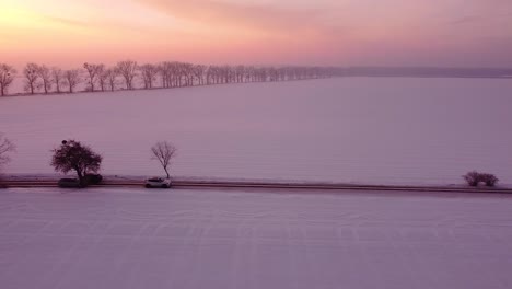 rural road through countryside at sunrise