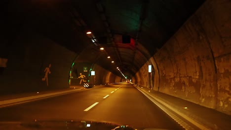 car journey through a tunnel in piedmont, italy