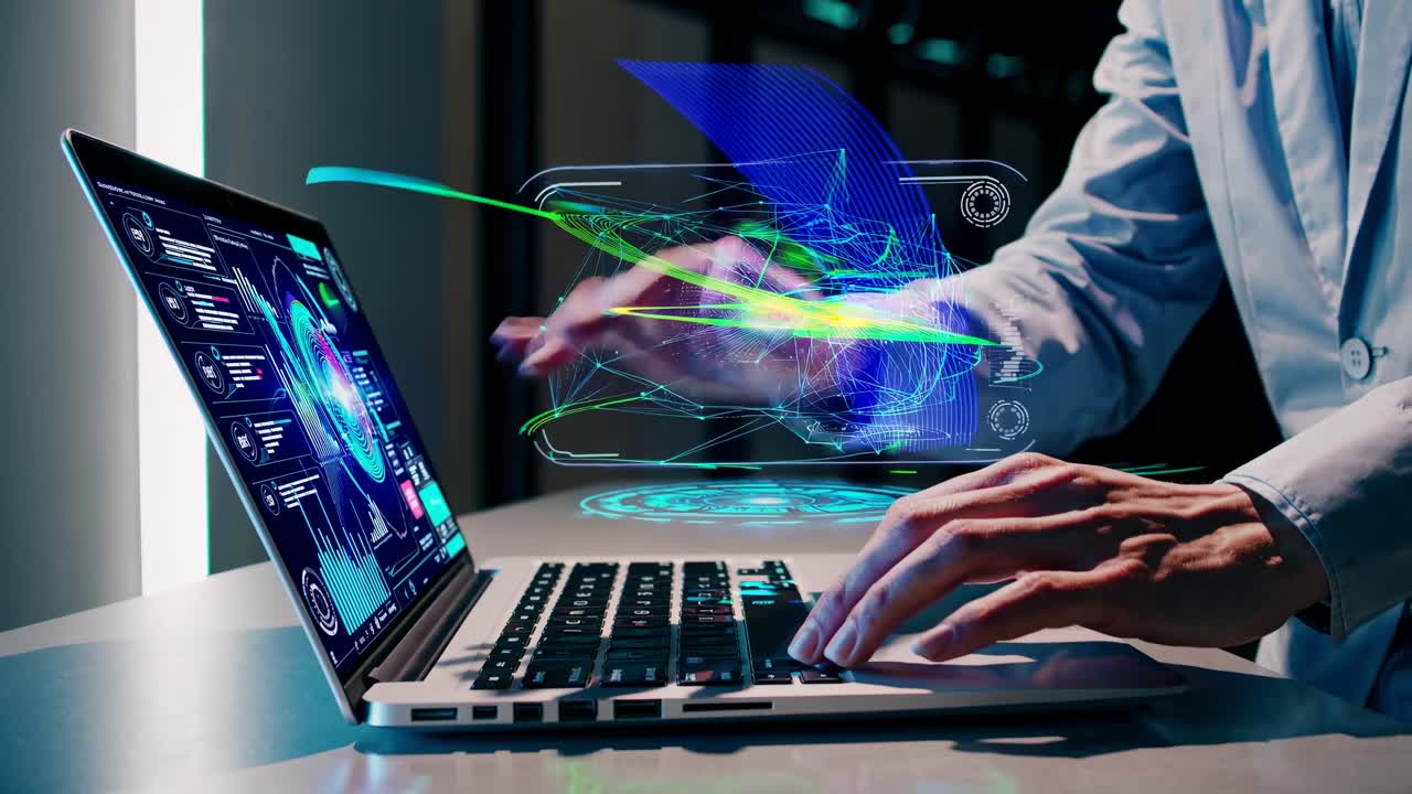 Futuristic video concept showing a person interacting with a holographic interface above a laptop