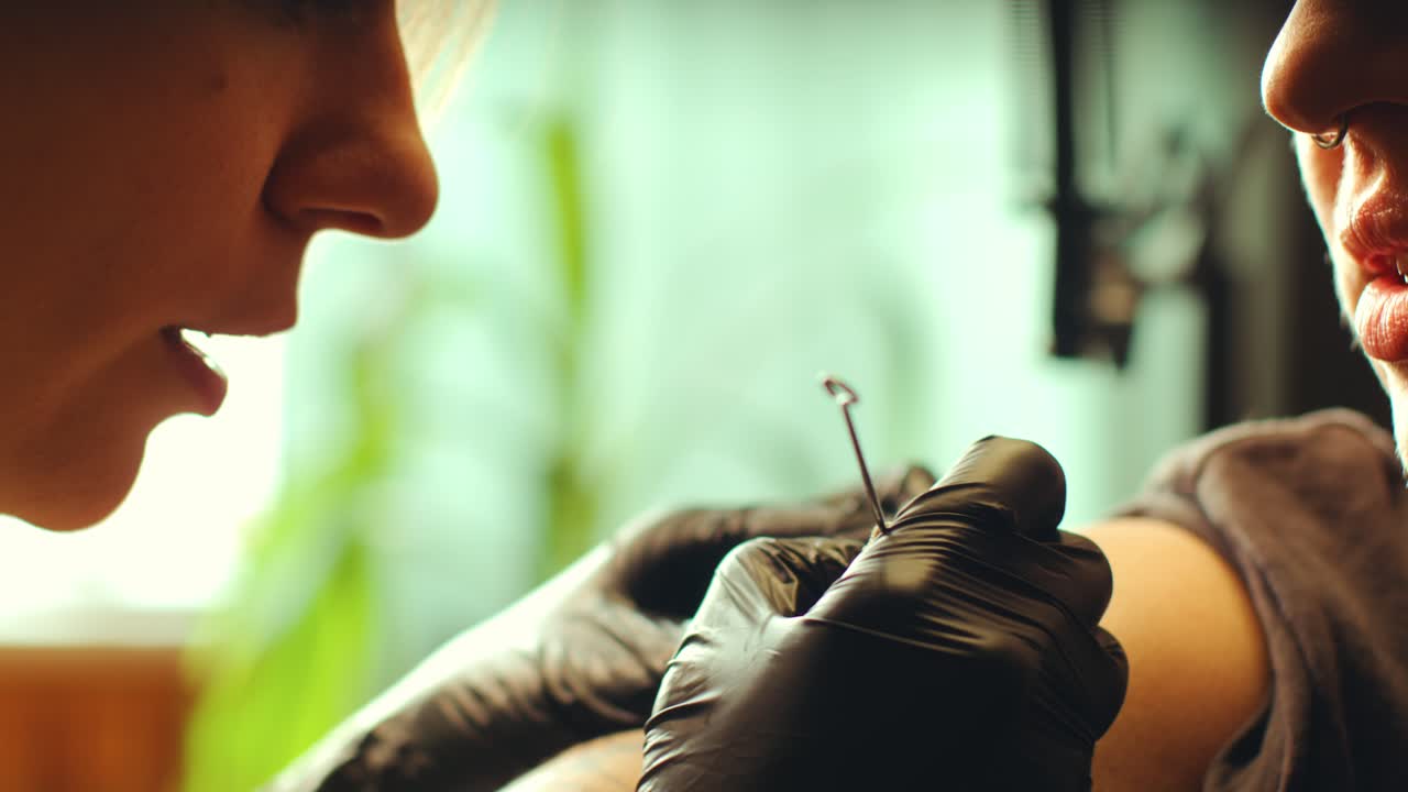 Close-Up of Woman Having Talk with Female Tattoo Artist in Salon