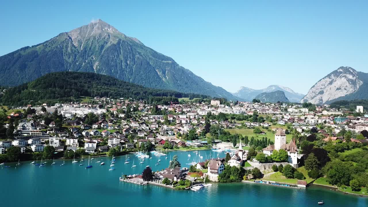Stunning Aerial View of a Lakeside Village in the Swiss Alps
