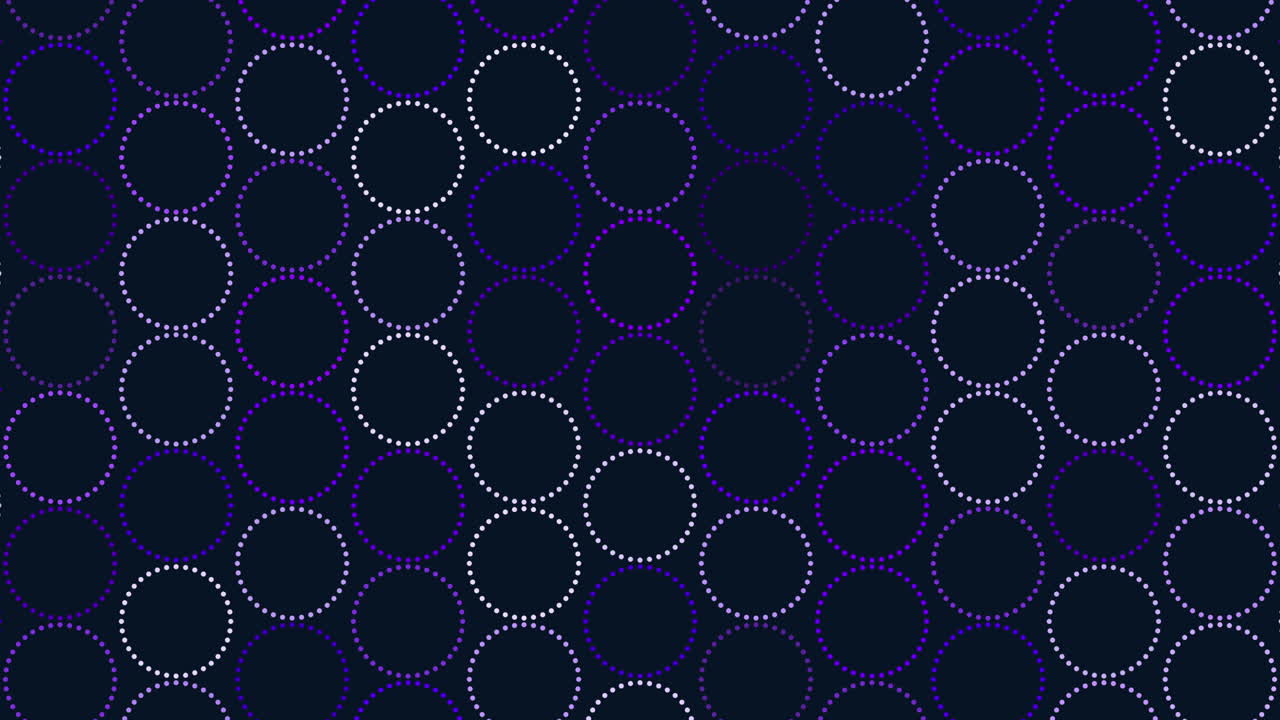 Circles and dots intricate symmetrical pattern on dark background