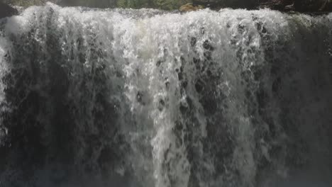 Powerful-waterfall-cascades-down-in-Owen-Sound,-Canada,-creating-a-mesmerizing-natural-spectacle