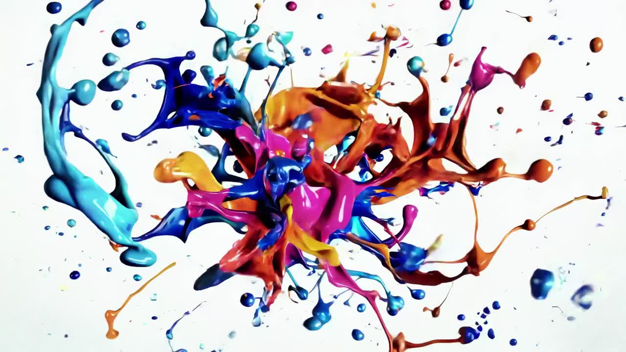 Dynamisk splash af levende farver fanget i en engel fra oven, hvilket skaber en energisk effekt