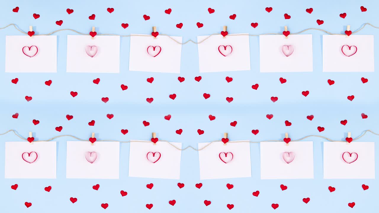 발렌타인 사랑의 마음은 종이에 인 로프에 매달려 있습니다. - 스 모션