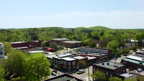 Drone-Pedestal-Up-of-Small-town-USA-Downtown-Hillsboro-North-Carolina-in-the-Summer