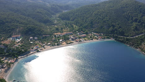 Aerial:-Panoramic-drone-shot-of-beautiful-Panormos-bay-in-Skopelos-island,-sporades,-Greece