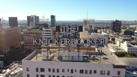 aerial of the knickerbocker hotel rooftop sign in downtown hollywood california