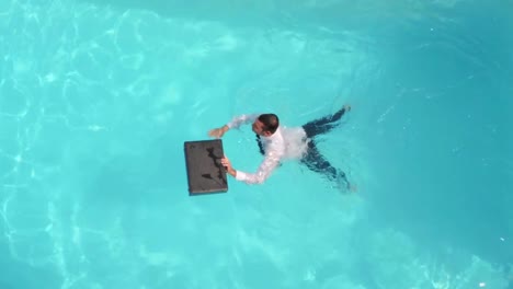 Businessman-swimming-in-the-pool