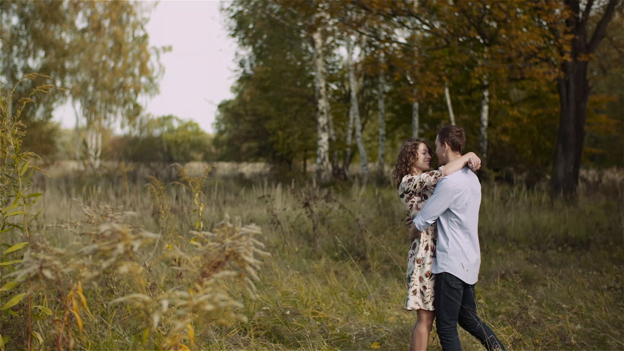 Loving pair embracing in nature