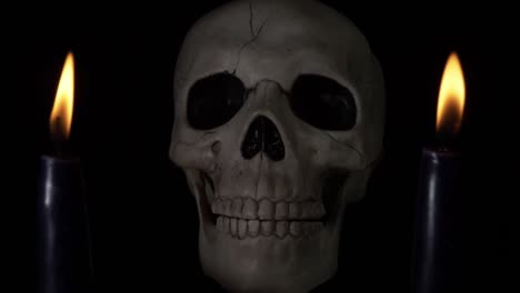 Time-lapse-of-human-skull-with-candles-with-lightening-storm-effect