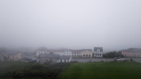 foggy village landscape