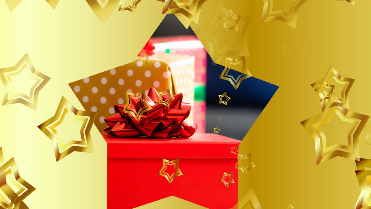 크리스마스 선물이 테이블 위에 떨어지는 별들의 애니메이션