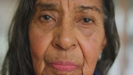 Senior-mexican-woman,-face-or-thinking-in-a-room