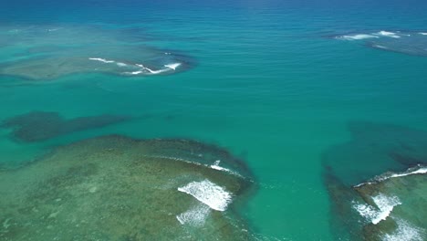 flying over the beach of são miguel dos milagres beach in the state of alagoas, brazil.