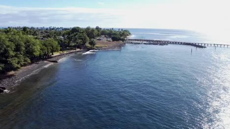 aerial panoramic view of shoreline to end of pier