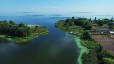 Aerial-landscape-blue-lake-on-skyline