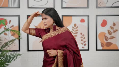 Indian-woman-looking-around-and-searching-something