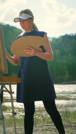 woman painting outdoors
