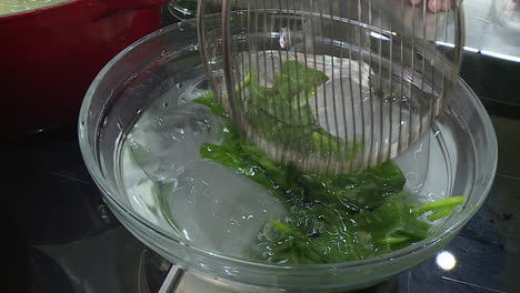 preparing spinach in ice bath