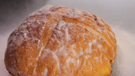 Freshly-baked-natural-bread-is-on-the-kitchen-table.