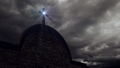 a cross on top of an old building against a dark cloud timelapse background