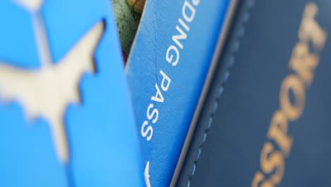 close-up of boarding pass and passport