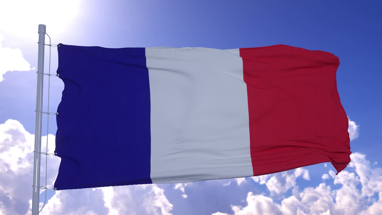 Bandera de Francia ondeando sobre un cielo azul claro